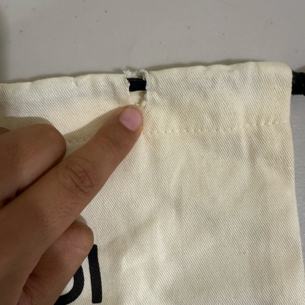 Fendi Cream Drawstring Pouch with Black Logo Text